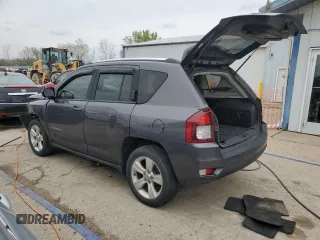 2014 Jeep Compass Latitude with VIN 1C4NJDEB4ED904731, listed as a Copart auction lot 51809165 with 104,760 mi miles and Salvage Title. Bid and sale history available at DreamBid. Image 2.
