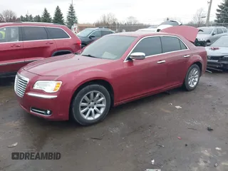 2013 Chrysler 300 C with VIN 2C3CCAEG4DH698893, listed as a IAAI auction lot 41189845 with 153,638 mi miles and . Bid and sale history available at DreamBid. Image 2.