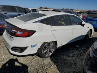 2021 Honda Clarity Plug-In Hybrid with VIN JHMZC5F1XMC001588, listed as a Copart auction lot 68252414 with 72,339 mi miles and Salvage Title. Bid and sale history available at carsss.com. Image 3.