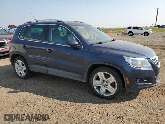 2011 Volkswagen Tiguan SEL with VIN WVGBV7AX1BW504132, listed as a Copart auction lot 64467484 with Not Provided miles and Salvage Title. Bid and sale history available at DreamBid. Image 4.