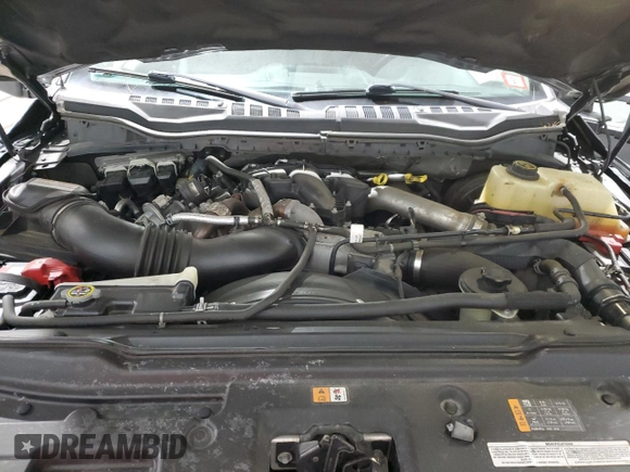 2017 Ford F-250 Lariat z VIN 1FT7W2BTXHED03169, wystawiony jako Copart lot #52261395 z przebiegiem 140 483 mil mil oraz Szkoda całkowita • Salvage title. Historia ofert i sprzedaży dostępna na DreamBid. Obrazek 13.