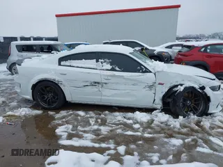 2022 Dodge Charger Scat Pack Widebody with VIN 2C3CDXGJ4NH183094, listed as a IAAI auction lot 41300119 with 31,800 mi miles and . Bid and sale history available at carsss.com. Image 6.