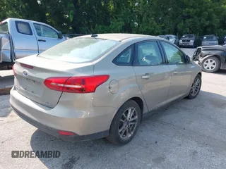 2016 Ford Focus SE z VIN 1FADP3F29GL361006, wystawiony jako IAAI lot #42387418 z przebiegiem 132 806 mil mil oraz . Historia ofert i sprzedaży dostępna na DreamBid. Obrazek 4.