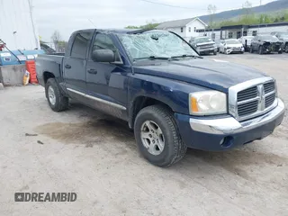 2005 Dodge Dakota Laramie with VIN 1D7HW58NX5S227633, listed as a IAAI auction lot 42122619 with 85,338 mi miles and . Bid and sale history available at DreamBid. Image 1.