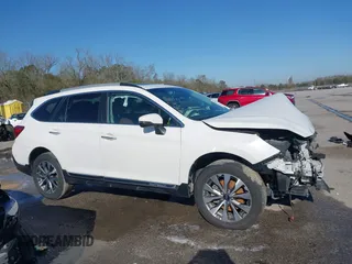2019 Subaru Outback Touring with VIN 4S4BSATC4K3340084, listed as a IAAI auction lot 41204749 with 49,852 mi miles and . Bid and sale history available at DreamBid. Image 14.