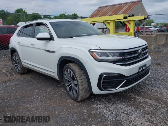 2021 Volkswagen Atlas SEL z VIN 1V2SE2CA7MC214805, wystawiony jako IAAI lot #42374591 z przebiegiem 61 775 mil mil oraz . Historia ofert i sprzedaży dostępna na DreamBid. Obrazek 1.