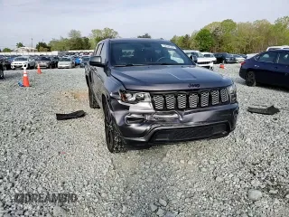 2017 Jeep Grand Cherokee Altitude with VIN 1C4RJEAG9HC813263, listed as a Copart auction lot 52532345 with 169,054 mi miles and Salvage title. Bid and sale history available at DreamBid. Image 12.