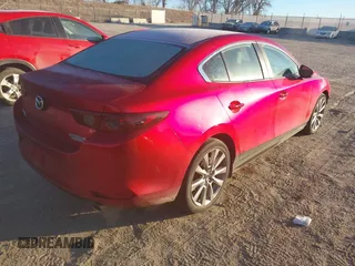2021 Mazda 3 Select with VIN 3MZBPBBM5MM208715, listed as a IAAI auction lot 41342526 with 35,702 mi miles and . Bid and sale history available at carsss.com. Image 4.