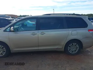 2011 Toyota Sienna XLE AAS with VIN 5TDYK3DCXBS117023, listed as a IAAI auction lot 41581785 with 216,341 mi miles. Bid and sale history available at carsss.com. Image 14.