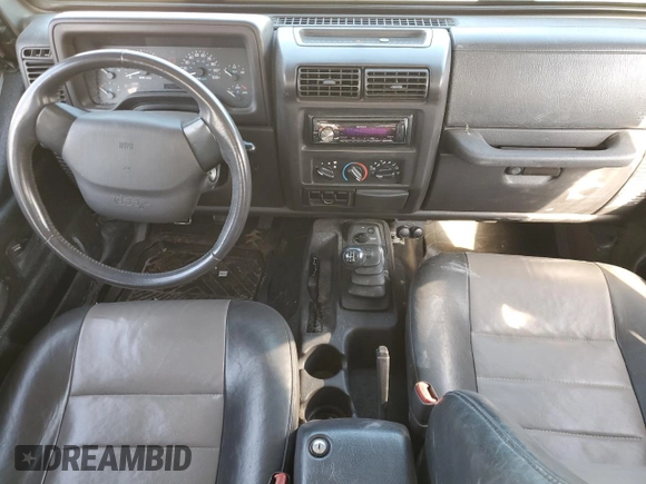 2000 Jeep Wrangler Sport with VIN 1J4FA49S4YP789348, listed as a Copart auction lot 50521365 with 0 mi miles and Salvage Title. Bid and sale history available at carsss.com. Image 8.