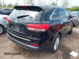 2016 Kia Sorento LX with VIN 5XYPGDA5XGG168325, listed as a IAAI auction lot 42123471 with 267,254 mi miles. Bid and sale history available at carsss.com. Image 4.