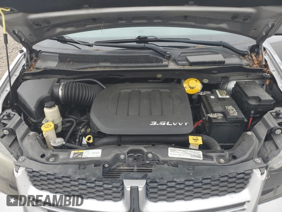 2015 Dodge Grand Caravan R/T with VIN 2C4RDGEG8FR607627, listed as a Copart auction lot 55865685 with 136,140 mi miles and Clean Title. Bid and sale history available at DreamBid. Image 12.