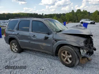 2006 Mazda Tribute S with VIN 4F2YZ06186KM08378, listed as a Copart auction lot 69391894 with Not Provided miles and Salvage Title. Bid and sale history available at DreamBid. Image 4.