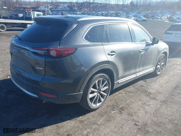 2016 Mazda CX-9 Signature with VIN JM3TCBEY3G0104689, listed as a IAAI auction lot 41257053 with 116,486 mi miles. Bid and sale history available at carsss.com. Image 4.