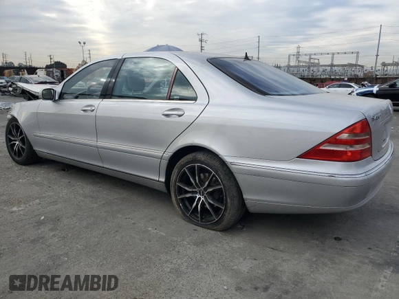 2002 Mercedes-Benz S-Class 4.3L with VIN WDBNG70J62A257551, listed as a Copart auction lot 84096614 with 113,860 mi miles and Salvage Title. Bid and sale history available at carsss.com. Image 2.