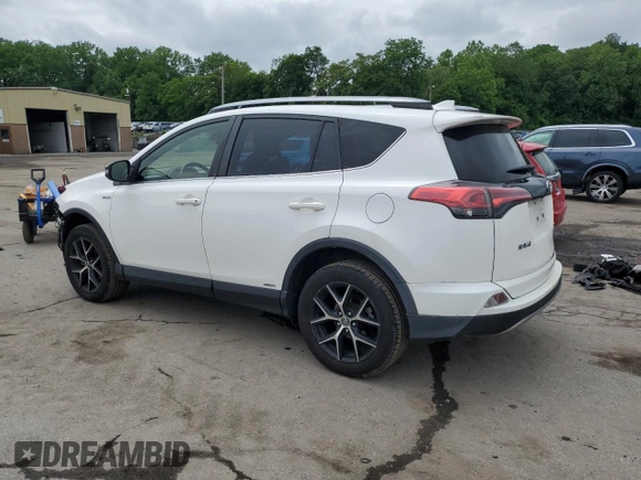 2018 Toyota RAV4 Hybrid SE with VIN JTMJJREV1JD172042, listed as a Copart auction lot 61418305 with 143,902 mi miles and Salvage title. Bid and sale history available at DreamBid. Image 2.