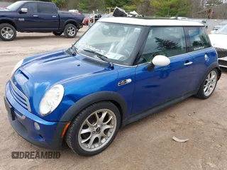 2006 MINI Hardtop S with VIN WMWRE33516TL22491, listed as a IAAI auction lot 42134690 with 163,912 mi miles and . Bid and sale history available at DreamBid. Image 2.