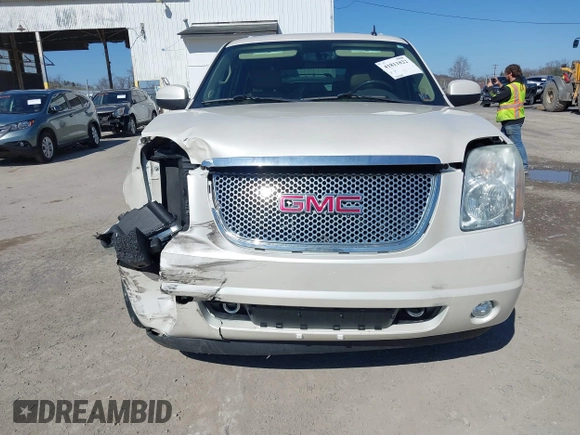 2011 GMC Yukon Denali with VIN 1GKS2EEF8BR237643, listed as a IAAI auction lot 41811822 with 134,309 mi miles. Bid and sale history available at carsss.com. Image 12.
