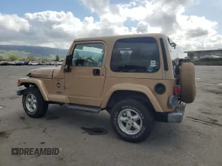 1999 Jeep Wrangler Sahara with VIN 1J4FY49S3XP441051, listed as a Copart auction lot 50946175 with 112,884 mi miles and Salvage Title. Bid and sale history available at carsss.com. Image 2.