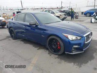 2020 Infiniti Q50 Red Sport 400 with VIN JN1FV7AP3LM630563, listed as a IAAI auction lot 42000146 with 63,327 mi miles and . Bid and sale history available at carsss.com. Image 1.