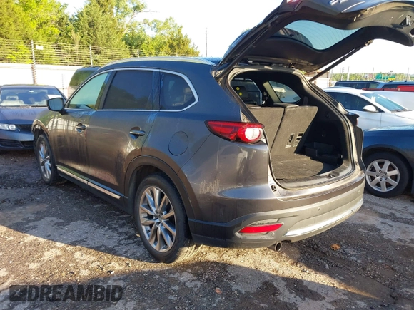 2018 Mazda CX-9 Grand Touring with VIN JM3TCBDY3J0231936, listed as a IAAI auction lot 42159391 with 105,125 mi miles and . Bid and sale history available at DreamBid. Image 3.