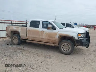 2015 GMC Sierra 2500HD available WiFi Denali with VIN 1GT120E84FF642823, listed as a IAAI auction lot 41593286 with 148,038 mi miles. Bid and sale history available at carsss.com. Image 13.