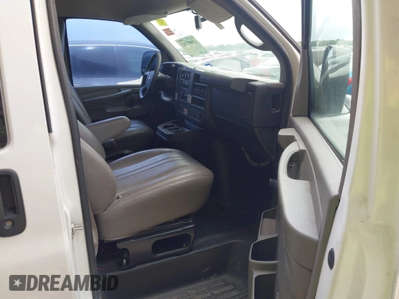 2013 Chevrolet Express Cargo with VIN 1GCSGAFX9D1179458, listed as a IAAI auction lot 42095702 with 212,186 mi miles and . Bid and sale history available at DreamBid. Image 5.