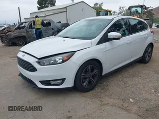 2016 Ford Focus SE with VIN 1FADP3KE8GL331379, listed as a IAAI auction lot 42111348 with 66,130 mi miles and . Bid and sale history available at carsss.com. Image 2.