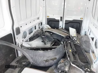 2023 Ford Transit Cargo with VIN 1FTBR1C89PKA63540, listed as a IAAI auction lot 41643089 with 65,898 mi miles. Bid and sale history available at carsss.com. Image 12.