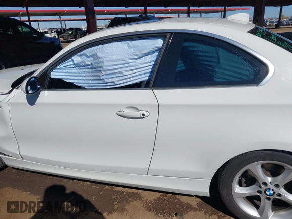 2009 BMW 1 Series 128i with VIN WBAUP73549VK74523, listed as a IAAI auction lot 41337097 with 108,608 mi miles and . Bid and sale history available at carsss.com. Image 14.