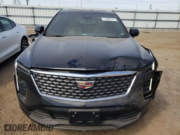 2024 Cadillac XT4 AWD Luxury with VIN 1GYFZBR4XRF199970, listed as a Copart auction lot 71496774 with 4,512 mi miles and Salvage Title. Bid and sale history available at carsss.com. Image 5.