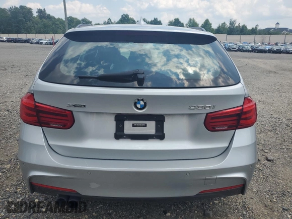 2017 BMW 3 Series 330i xDrive with VIN WBA8K3C57HK678988, listed as a Copart auction lot 65394344 with 67,918 mi miles and Salvage Title. Bid and sale history available at carsss.com. Image 6.