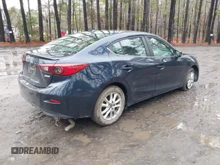 2015 Mazda 3 i Grand Touring with VIN 3MZBM1W78FM219833, listed as a IAAI auction lot 41578872 with 61,138 mi miles and . Bid and sale history available at DreamBid. Image 4.