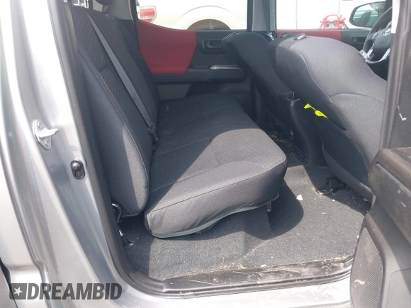 2023 Toyota Tacoma SR with VIN 3TYCZ5AN2PT176554, listed as a IAAI auction lot 42148651 with 15,255 mi miles and . Bid and sale history available at DreamBid. Image 8.