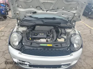 2011 MINI Hardtop S with VIN WMWSV3C58BTY11580, listed as a Copart auction lot 62081615 with 112,336 mi miles and Salvage title. Bid and sale history available at DreamBid. Image 11.
