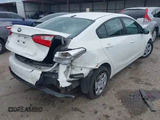 2016 Kia Forte LX z VIN KNAFK4A63G5486330, wystawiony jako IAAI lot #41898559 z przebiegiem 149 606 mil mil oraz . Historia ofert i sprzedaży dostępna na DreamBid. Obrazek 4.