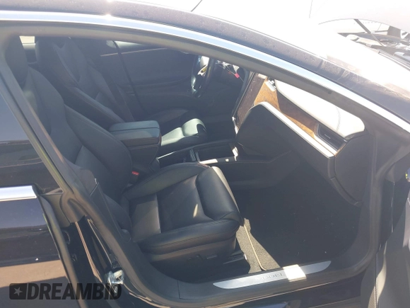 2020 Tesla Model S Long Range with VIN 5YJSA1E27LF397346, listed as a IAAI auction lot 40579015 with 43,779 mi miles and . Bid and sale history available at DreamBid. Image 5.