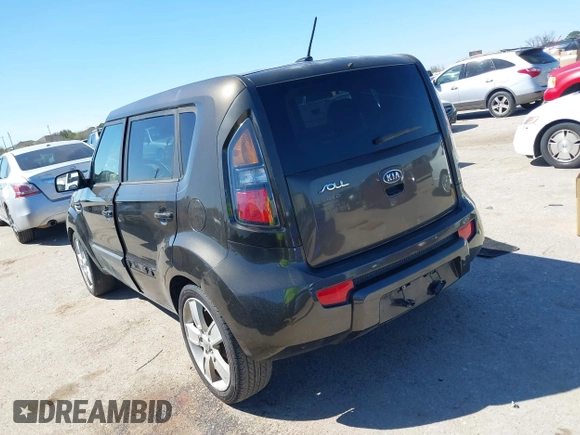 2011 Kia Soul + with VIN KNDJT2A22B7243696, listed as a IAAI auction lot 41762093 with 195,696 mi miles. Bid and sale history available at carsss.com. Image 3.