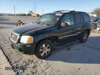 2004 GMC Envoy SLE with VIN 1GKDT13S142197514, listed as a Copart auction lot 89014465 with 202,790 mi miles and Salvage Title. Bid and sale history available at carsss.com. Image 1.