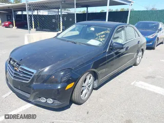 2010 Mercedes-Benz E-Class E 550 Luxury with VIN WDDHF9AB0AA136555, listed as a IAAI auction lot 42069576 with 129,775 mi miles. Bid and sale history available at carsss.com. Image 2.