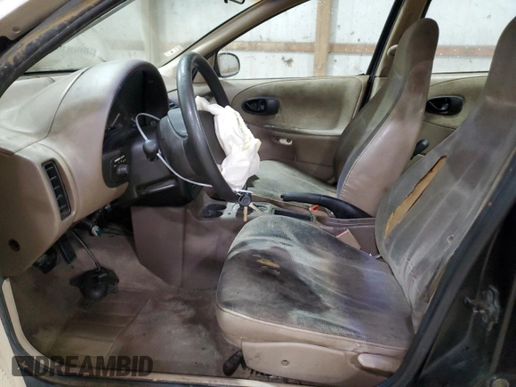 1998 Saturn SL with VIN 1G8ZH5284WZ283758, listed as a Copart auction lot 51630555 with 200,690 mi miles and Salvage title. Bid and sale history available at DreamBid. Image 7.