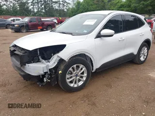 2021 Ford Escape SE with VIN 1FMCU0G67MUA28772, listed as a IAAI auction lot 42114499 with 21,818 mi miles and . Bid and sale history available at DreamBid. Image 2.