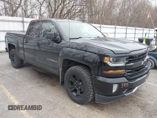 2016 Chevrolet Silverado 1500 LT with VIN 1GCVKREC5GZ354867, listed as a IAAI auction lot 41955455 with 164,971 mi miles. Bid and sale history available at carsss.com. Image 1.