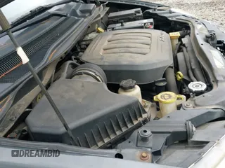 2012 Dodge Grand Caravan SE with VIN 2C4RDGBG9CR285810, listed as a IAAI auction lot 43317721 with 162,753 mi miles and . Bid and sale history available at DreamBid. Image 12.