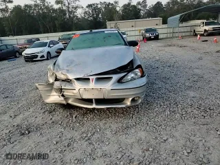 2004 Pontiac Grand Am GT1 with VIN 1G2NV52E14M667692, listed as a Copart auction lot 73339504 with 156,066 mi miles and Salvage Title. Bid and sale history available at carsss.com. Image 11.