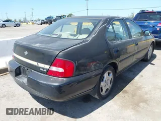 2001 Nissan Altima GXE with VIN 1N4DL01A21C216440, listed as a IAAI auction lot 41999928 with 169,289 mi miles. Bid and sale history available at carsss.com. Image 4.