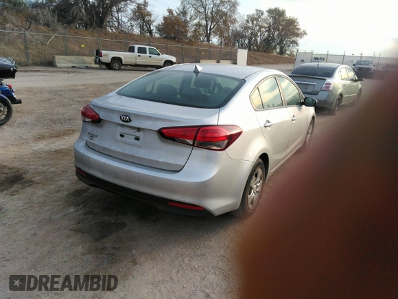2018 Kia Forte LX with VIN 3KPFK4A79JE210080, listed as a IAAI auction lot 40681931 with 124,986 mi miles and . Bid and sale history available at DreamBid. Image 4.