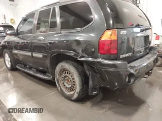 2005 GMC Envoy SLT z VIN 1GKDT13S852281122, wystawiony jako IAAI lot #42292577 z przebiegiem 156 052 mil mil oraz . Historia ofert i sprzedaży dostępna na DreamBid. Obrazek 6.