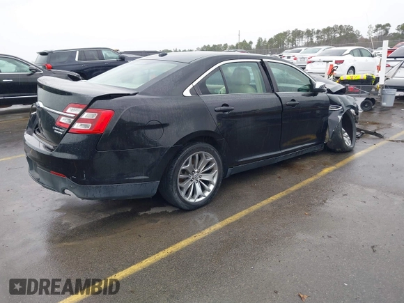 2014 Ford Taurus Limited with VIN 1FAHP2F87EG130532, listed as a IAAI auction lot 41618112 with 118,474 mi miles. Bid and sale history available at carsss.com. Image 4.