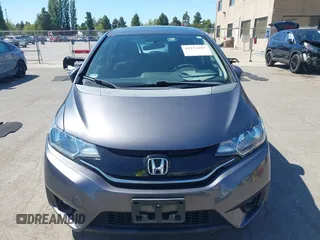 2015 Honda Fit EX-L z VIN 3HGGK5H86FM746265, wystawiony jako IAAI lot #42253205 z przebiegiem 75 491 mil mil oraz . Historia ofert i sprzedaży dostępna na DreamBid. Obrazek 12.